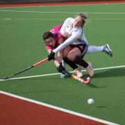 Ben Rhydding's Kate Wood tackles Elinor Thomas of Sutton Colfield