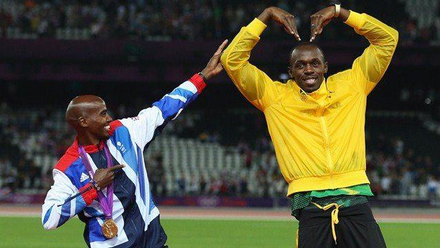 Image of the games: Mo Farah and Usain Bolt swap poses...