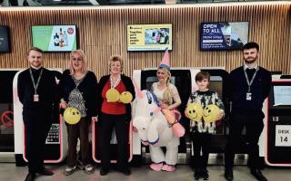 Left to Right; Connor Ivison from Leeds Bradford Airport, Carnival Committee members Nicola and Julia Briggs, Carnival Co-chair Jo Kenyon, Happiness Champion Ewan Law and Team member from Leeds Bradford Airport, Joe Price