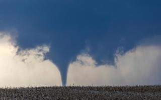 A tornado is seen near north of Waverly, Nebraska (Chris Machian/Omaha World-Herald via AP)